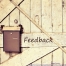 Stock image saying 'Feedback' on a wooden fence with a mailbox | image credit: User Pixabay.com on Pexels.com