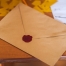 A sealed envelope placed on top of a table | photo credit: pexels.com (John-Mark Smith)
