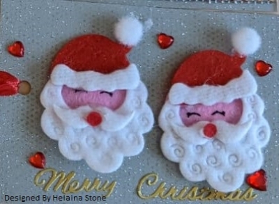 3D design with two Santa heads and the words 