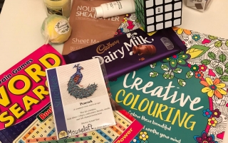 contents of the Parent/Carer Well-being Packs from Manchester Parent Carer Forum & 4CT: MPCF bag, pamper items, activity booklets, chocolates, etc