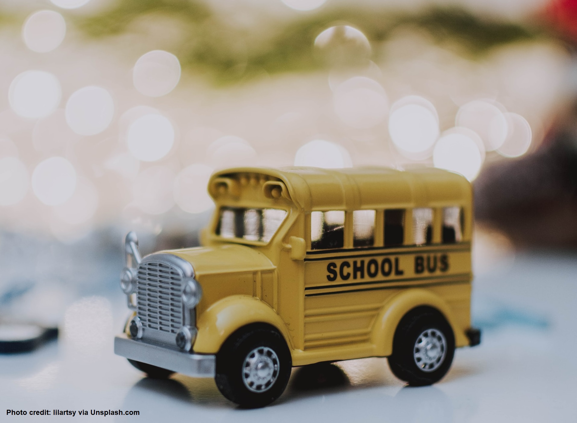 A toy yellow school bus