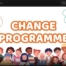 This screenshot of Manchester's Change Programme video shows the words "CHANGE PROGRAMME" in big, bold orange-and-white text, with an illustration of a diverse group of people under it.