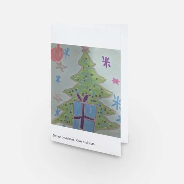 The image shows a mock-up of the festive card with Achanti, Kemi and Ruth's design (showing a Christmas tree).