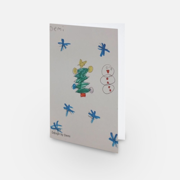 The image shows a mock-up of the festive card with Demi's design (showing a Christmas tree, snowflakes and a snowman).