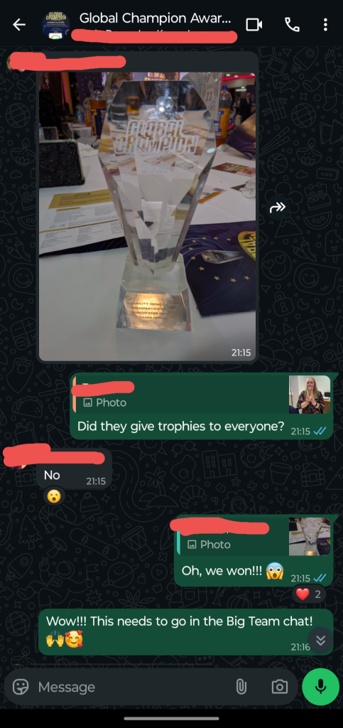 The photo is a screenshot of the chat when the team shared a pic of our trophy for the first time.
