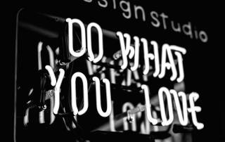 lights spelling the words "DO WHAT YOU LOVE" | image source: Jason Leung via Unsplash.com