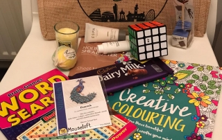 contents of the Parent/Carer Well-being Packs from Manchester Parent Carer Forum & 4CT: MPCF bag, pamper items, activity booklets, chocolates, etc