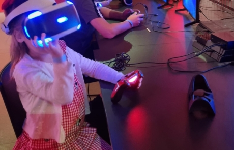 A girl enjoying a virtual reality game at SIM's Power UP exhibition