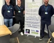 The photo shows John, Andy and Chris from SEND Dads Society surrounding their banner at the group's first session in March 2024.