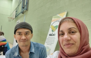 The photo shows Jordan (left) and Tara (right) from the MPCF team, with the forum banner behind them, at the Local Offer Drop-in @ Woodhouse Park Lifestyle Centre back in 25 September 2024.