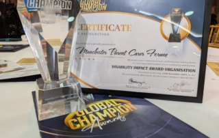The photo shows our certificate and trophy for the Disability Impact category at the Global Champion Awards of 2025.
