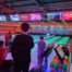 The photo shows some families enjoying a game of bowling during MPCF's SEND Community Offer inclusive session at Tenpin Harpurhey in December 2025.
